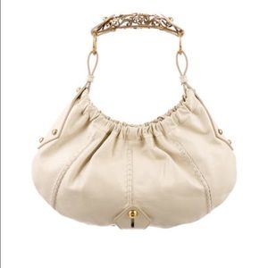 Yves Saint Laurent Vincennes in creme color